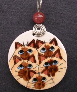 A Gaggle of Siamese Cats